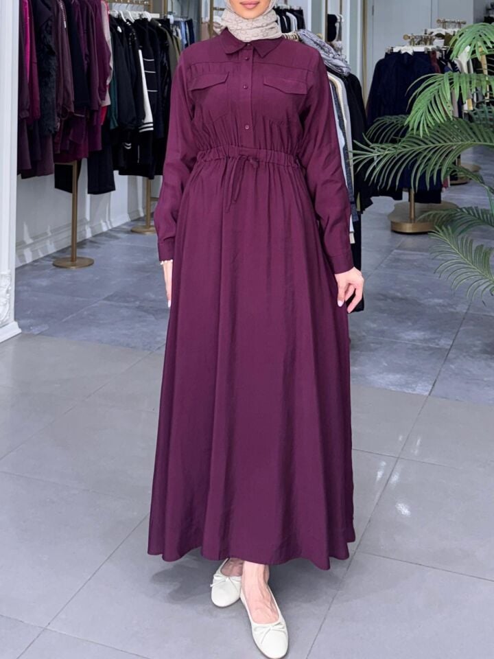 CEP DETAYLI BELİ BÜZGÜLÜ ELBİSE MÜRDÜM